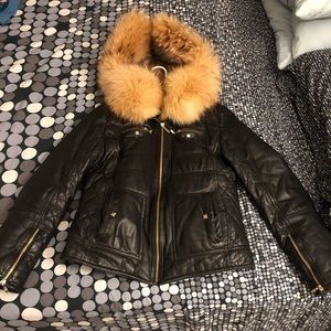 Leather jacket with arctic fox